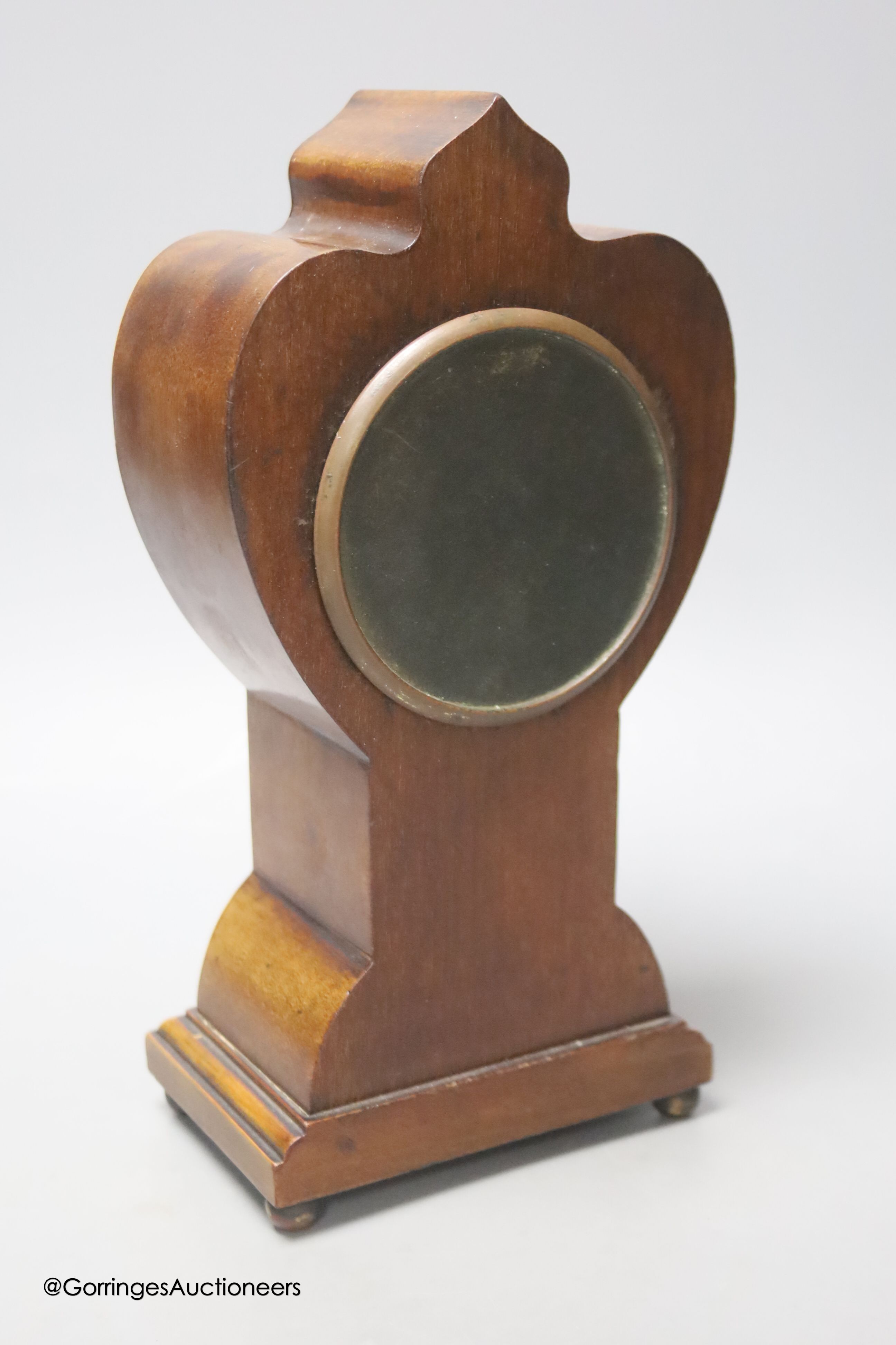 A French Art Nouveau mahogany and marquetry mantel timepiece, height 26cm